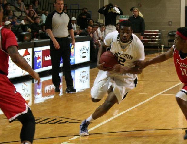 Sophomore guard Marcus Cooper drives to the basket.