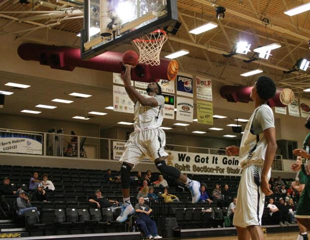 Freshman forward Axel Mpoyo elevates for two of his 12 points against Trinidad State in the 81-74 victory.